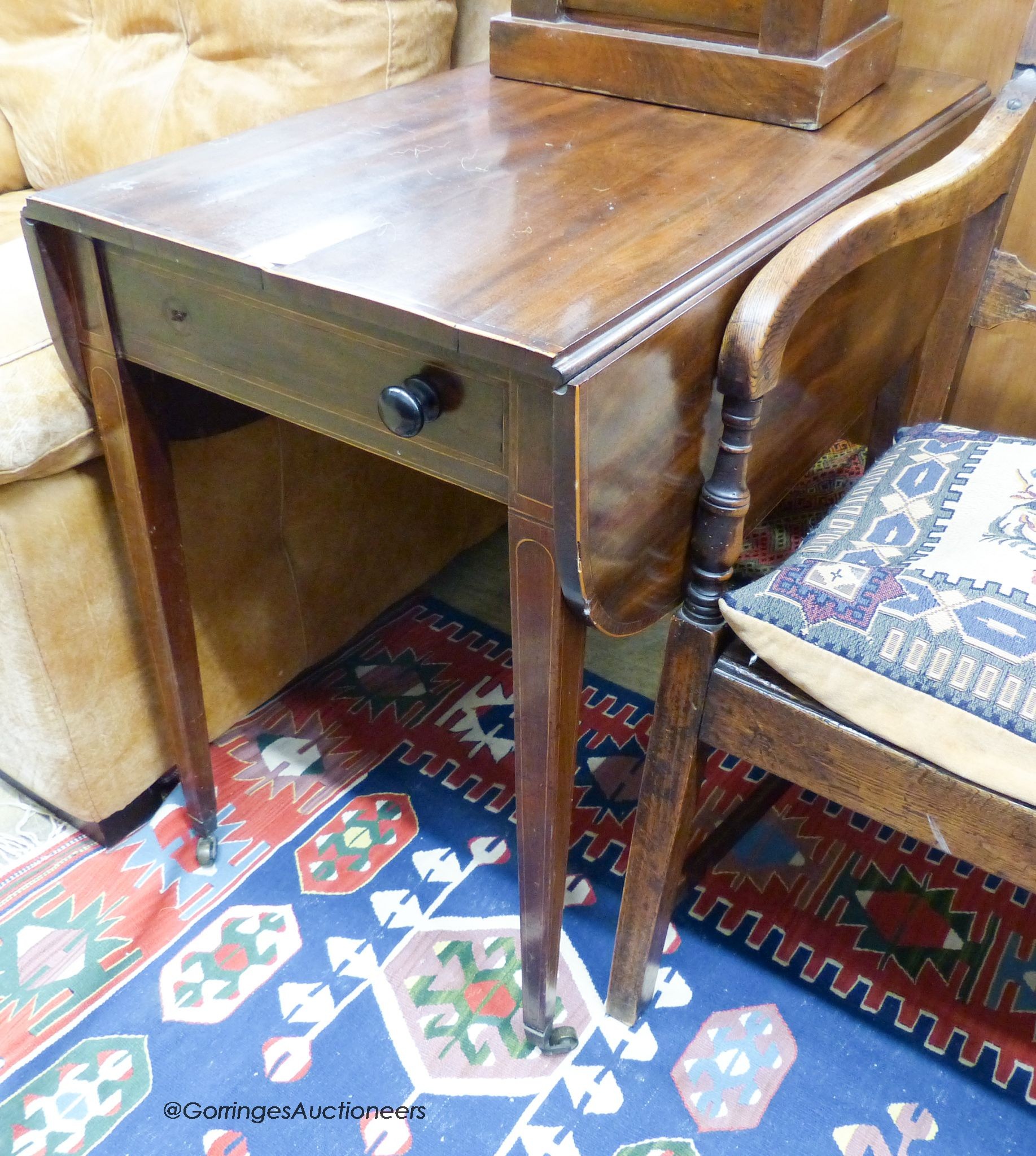 A George III mahogany inlaid Pembroke table, width 84cm, depth 48cm, height 71cm                                                                                                                                            