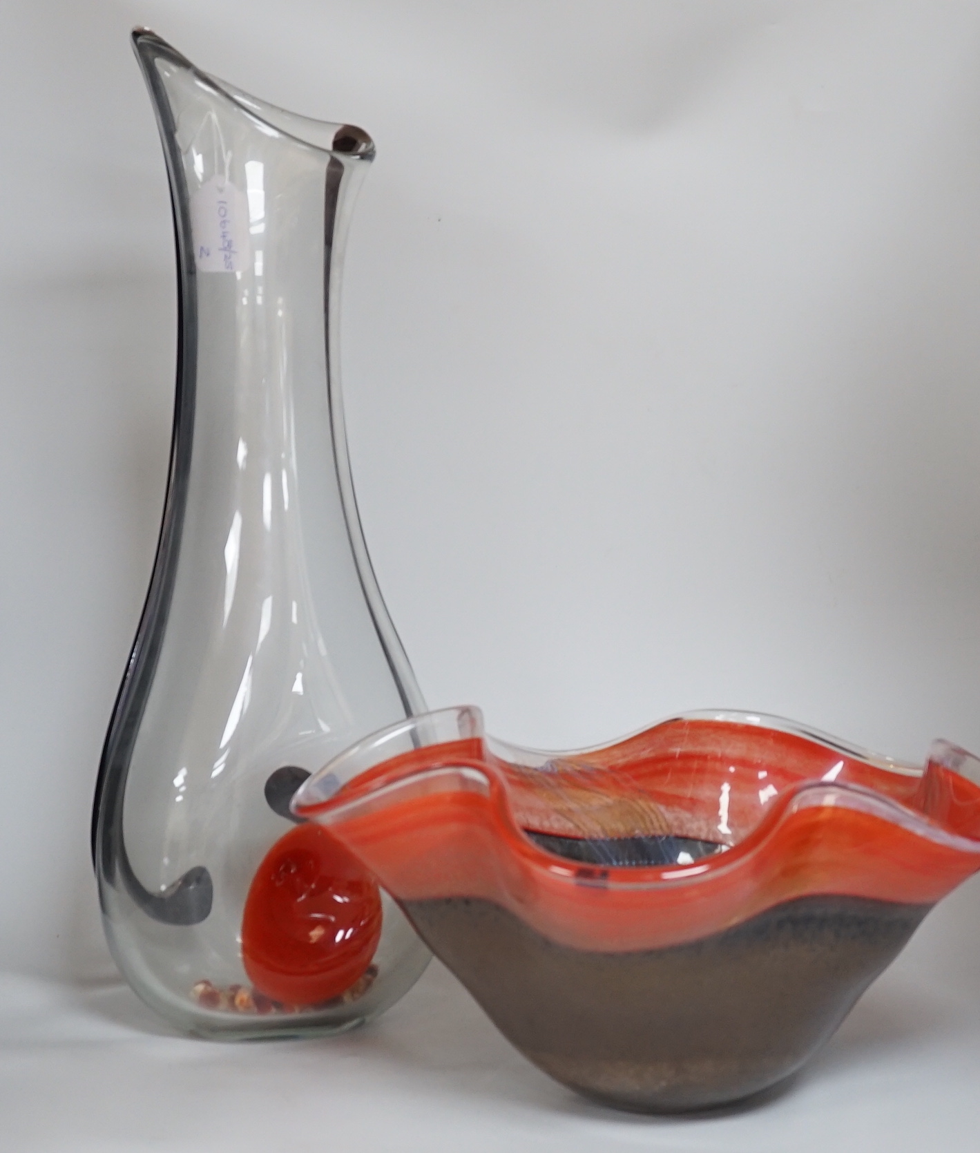 An Art glass bowl, labelled Svaja and a similar unmarked art glass vase, 40cm wide                                                                                                                                          