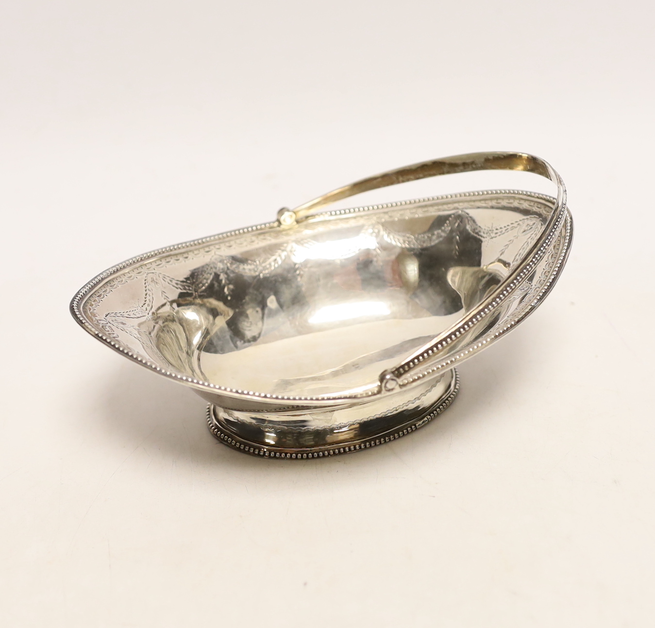 A George III engraved silver oval epergne basket?, John Lambe, London, 1785, 15.2cm, 3.4oz.                                                                                                                                 