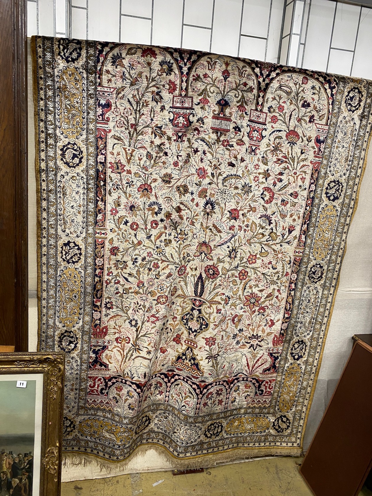 A Kashan part silk ivory ground 'Tree of Life' rug, 210 x 136cm                                                                                                                                                             