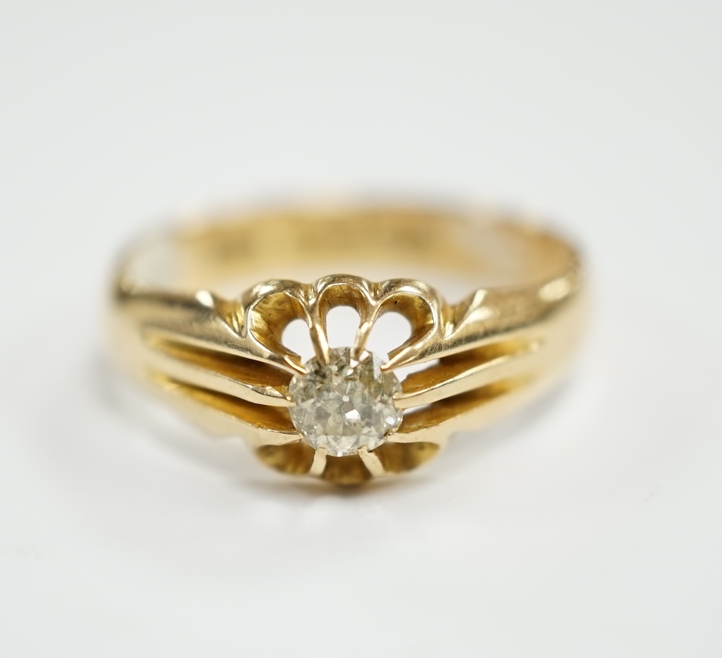 A George V 18ct gold and claw set solitaire diamond ring, size Q, gross weight 4.9 grams.                                                                                                                                   