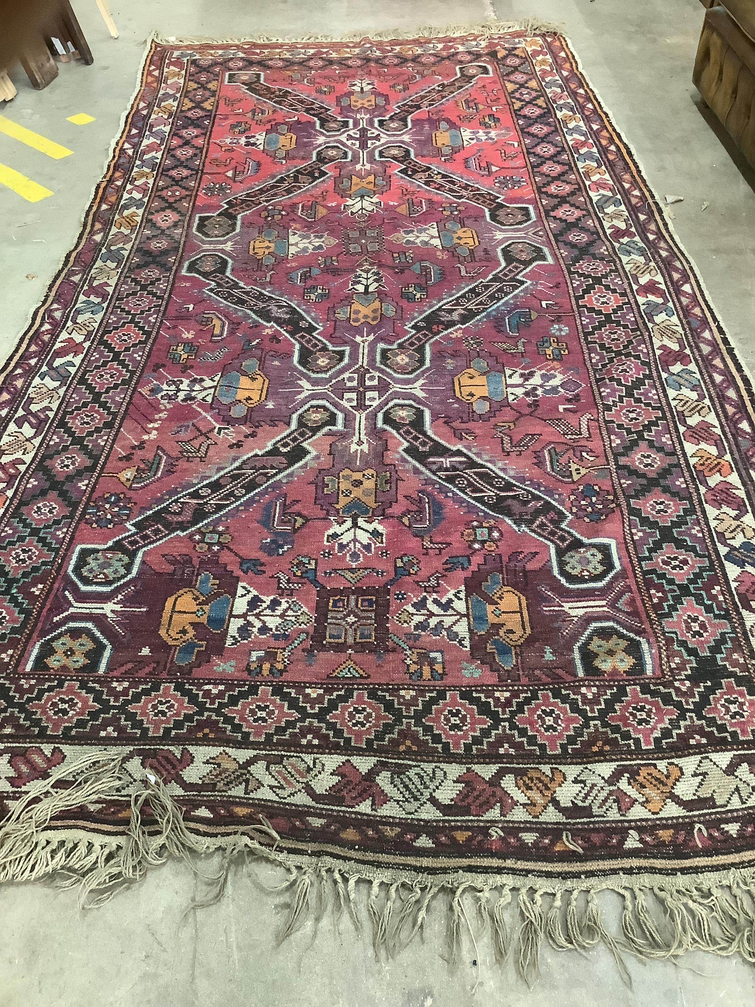 A Caucasian carpet, 330 x 180cm                                                                                                                                                                                             