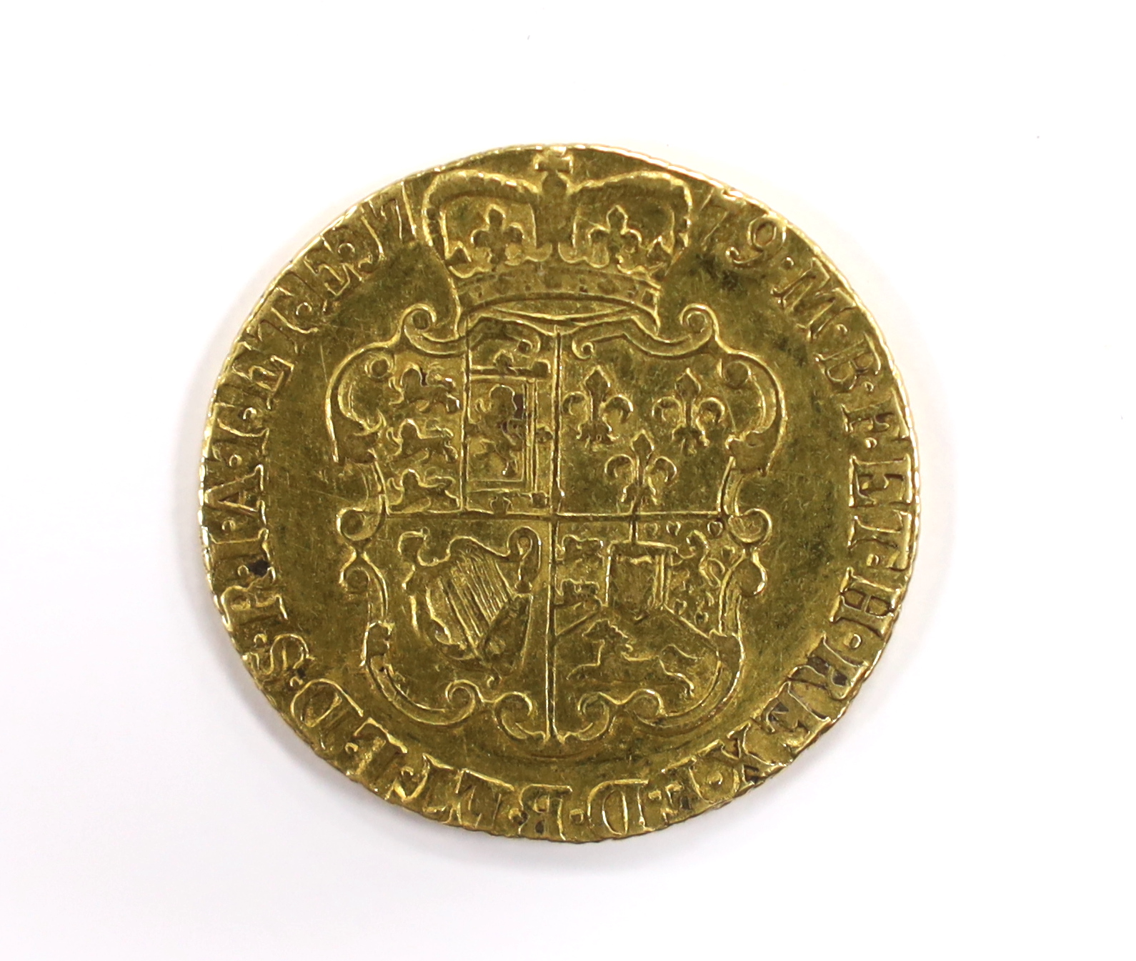 British gold coins - A George III gold guinea, 1779, fourth head, VF, (S3728), Provenance - bought from Richard Lobel and co, London, 7th March 1977 for £170.                                                              