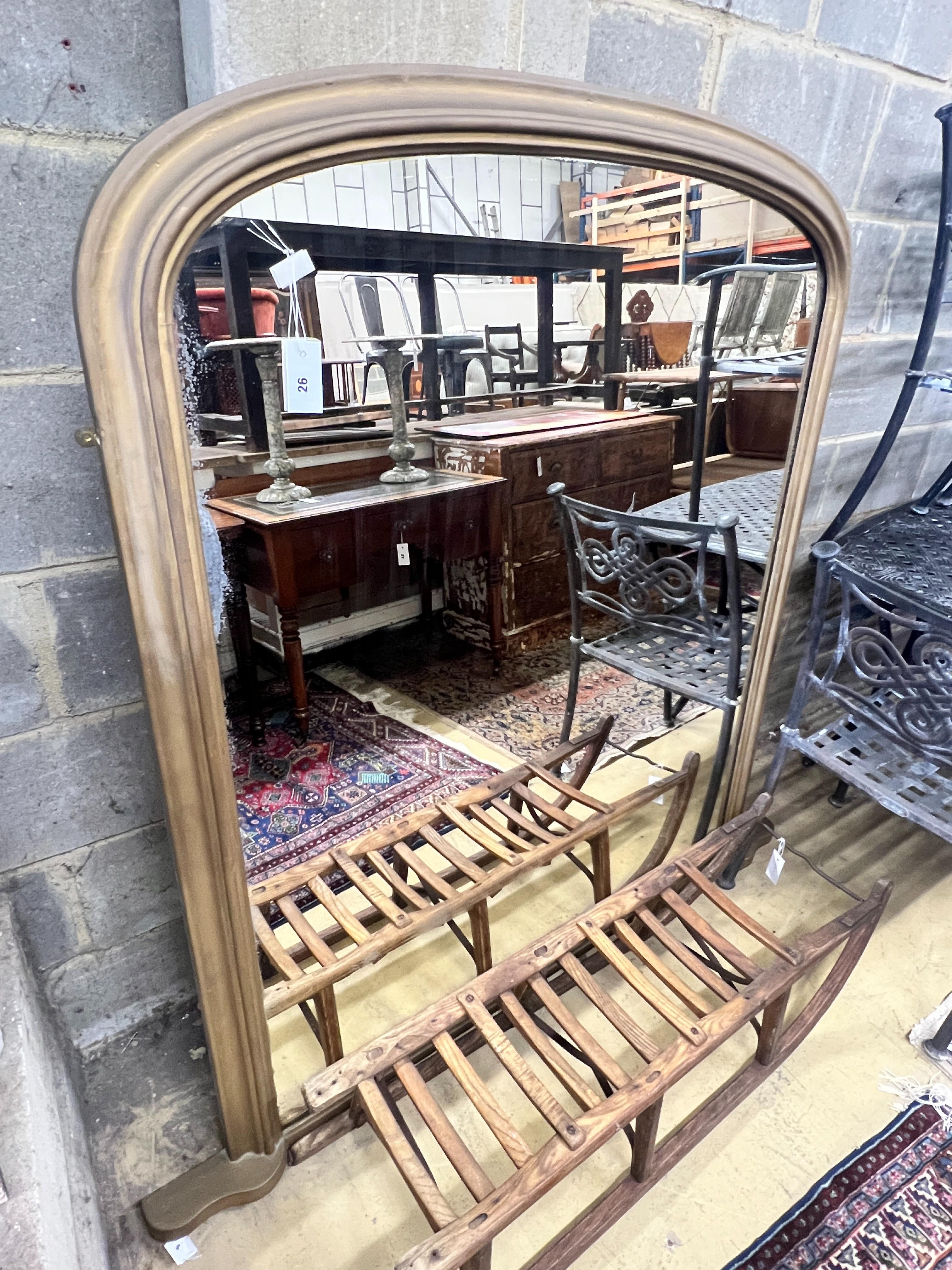 A Victorian gilt framed overmantel mirror, re-painted, width 124cm, height 149cm                                                                                                                                            