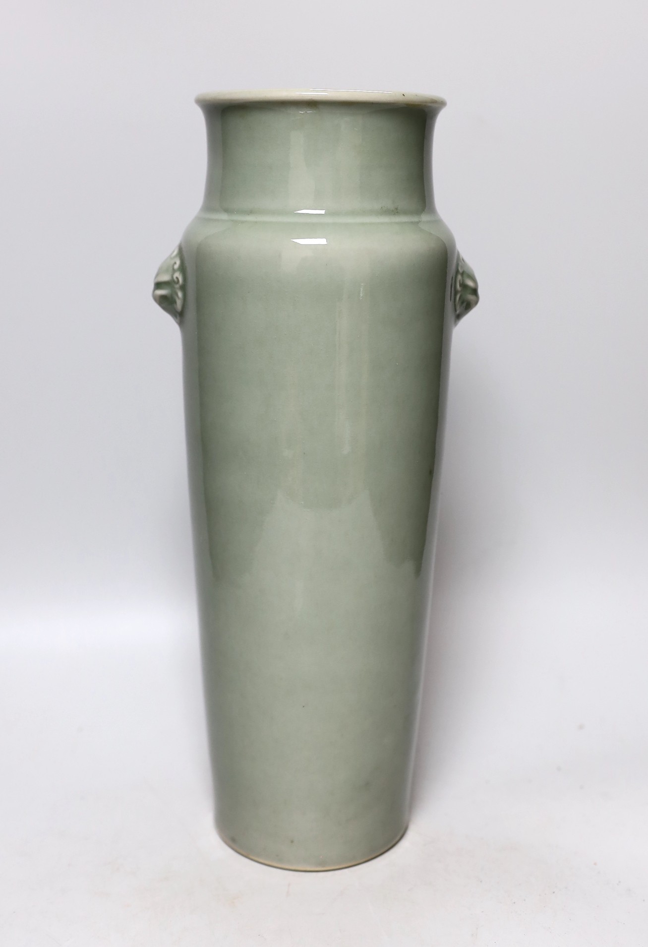 A Chinese celadon glazed vase, 37cms high                                                                                                                                                                                   