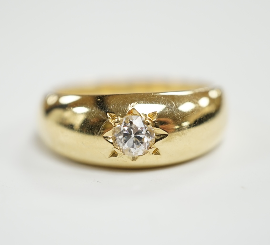 An 18ct gold and gypsy set solitaire diamond ring, size Q, gross weight 6.7 grams.                                                                                                                                          