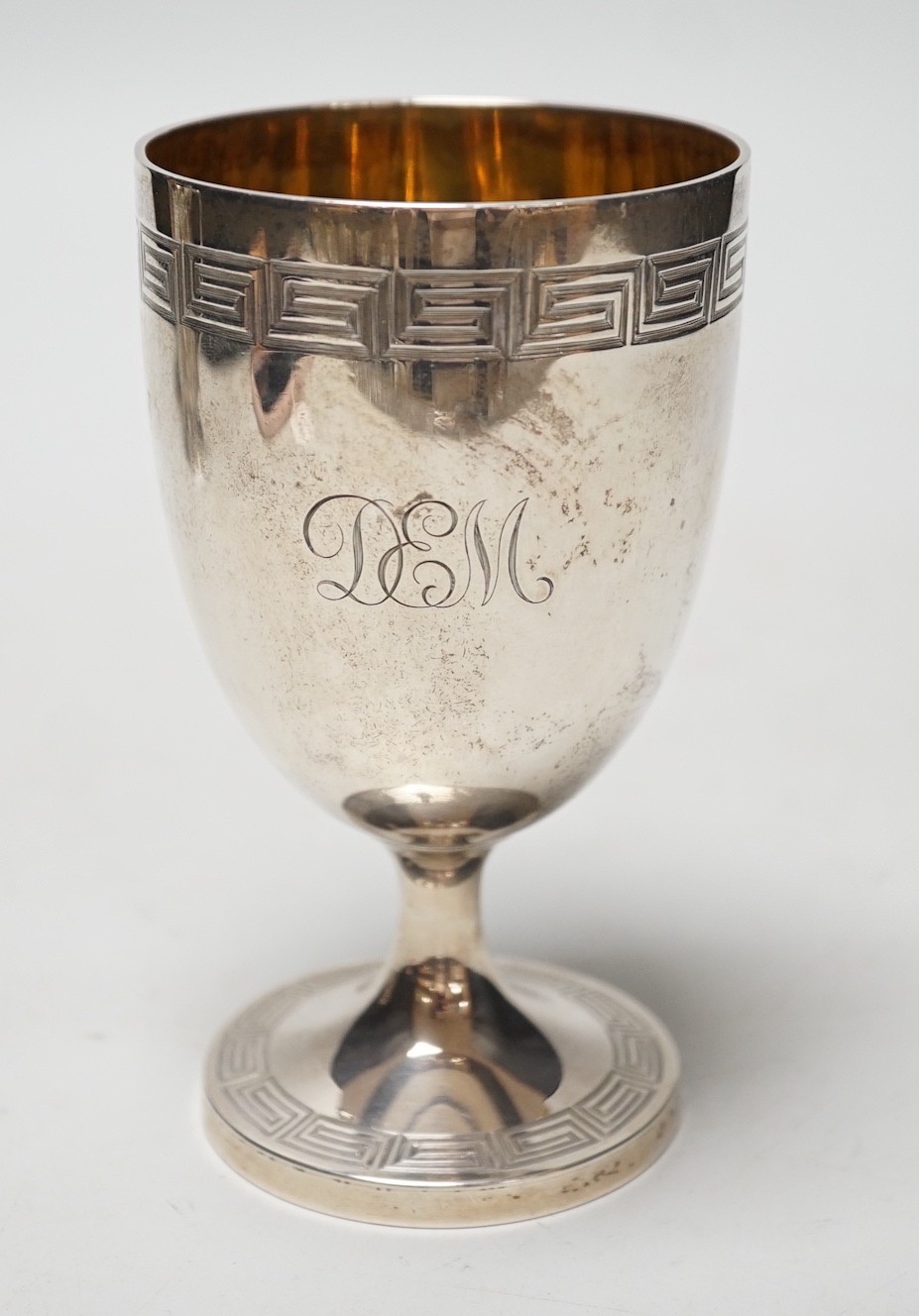 A Victorian silver goblet with Greek key banding, by Hunt & Roskell, (ex Storr & Mortimer), London, 1866, 12.4cm, 5.4oz.                                                                                                    
