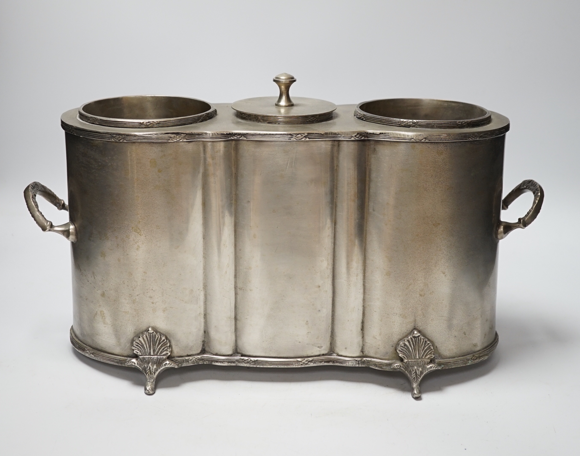 A Continental pewter two bottle champagne cooler, 39cm wide                                                                                                                                                                 