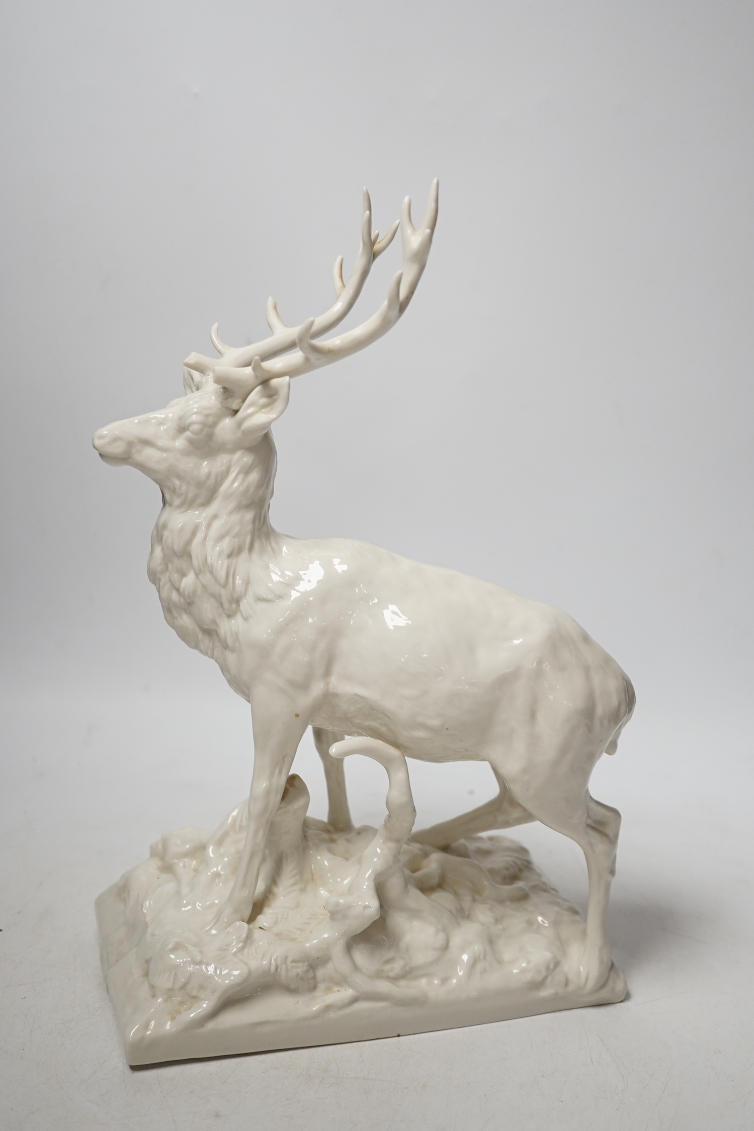 A Nymphenburg white glazed porcelain model of a stag, 31cm high                                                                                                                                                             