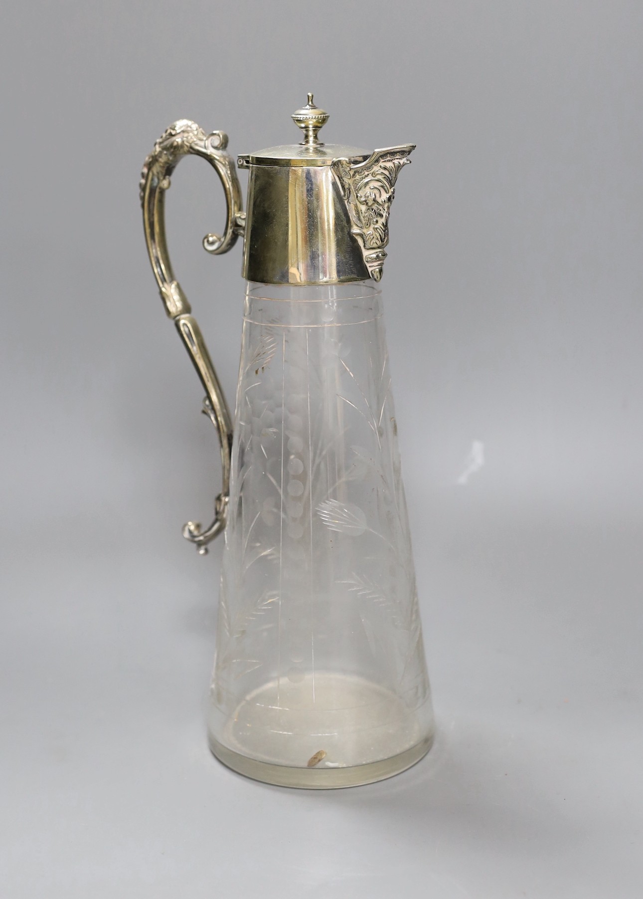 An electroplate mounted cut glass claret jug, 30cm                                                                                                                                                                          