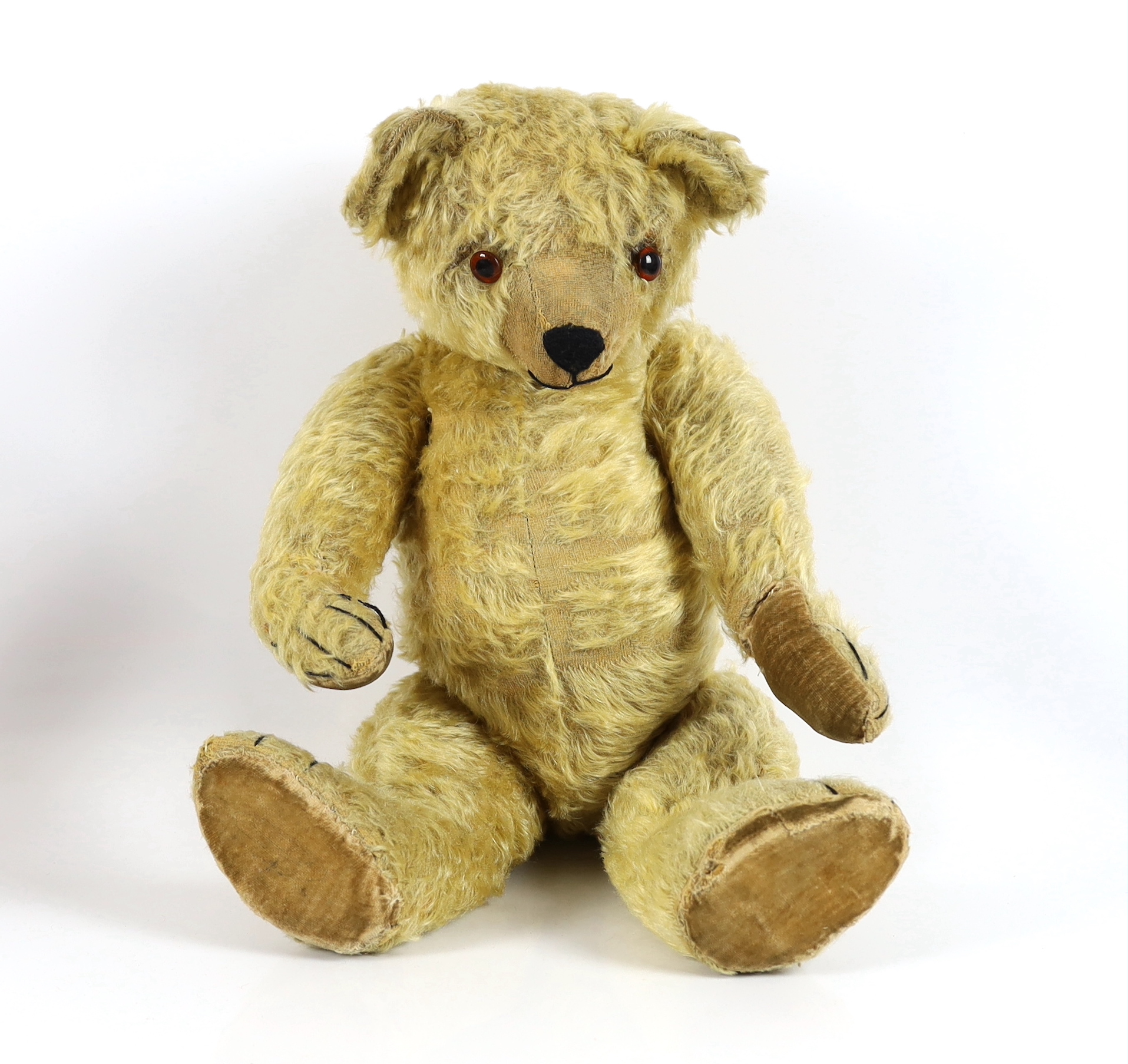 A large 1930's Chiltern bear, 53cm, with replaced nose stitching, some hair loss generally                                                                                                                                  