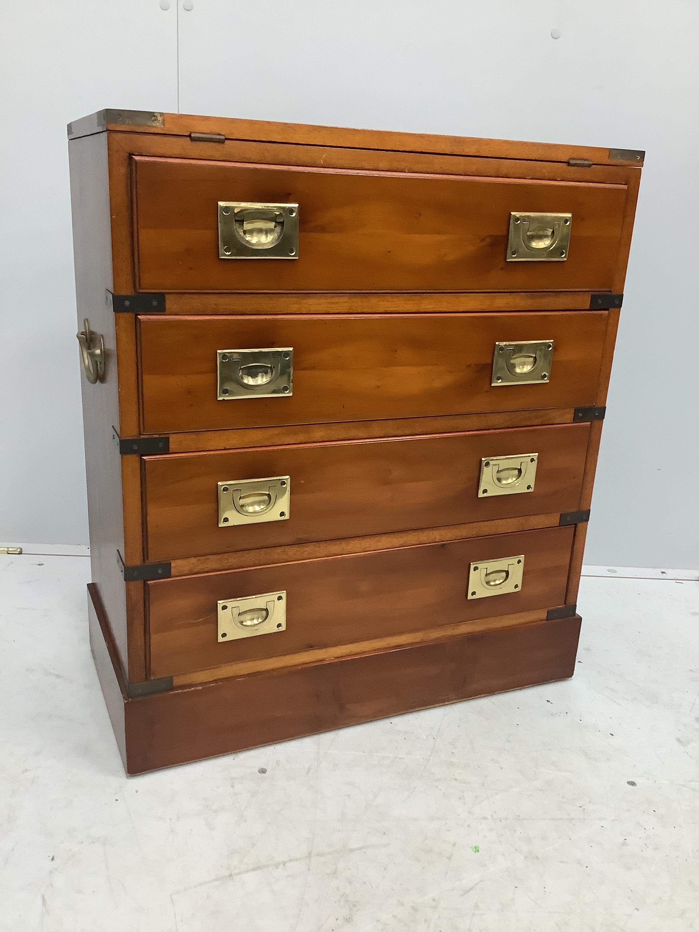 A small reproduction 19th century style yew wood military four drawer bachelors chest, width 61cm, depth 30cm, height 71cm                                                                                                  